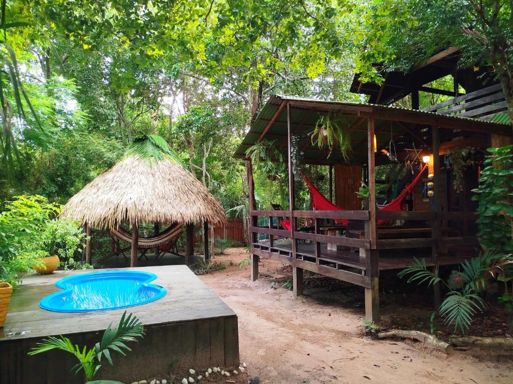 a resort with a swing and a playground at Recanto Shanti in Alter do Chao