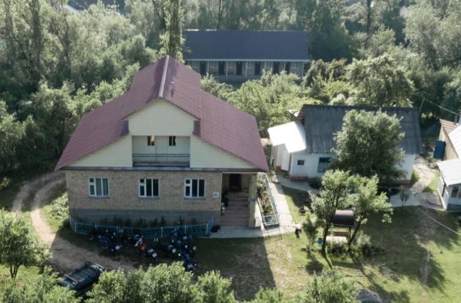 an aerial view of a house with a roof at CBT Arkit guest house in Arkit