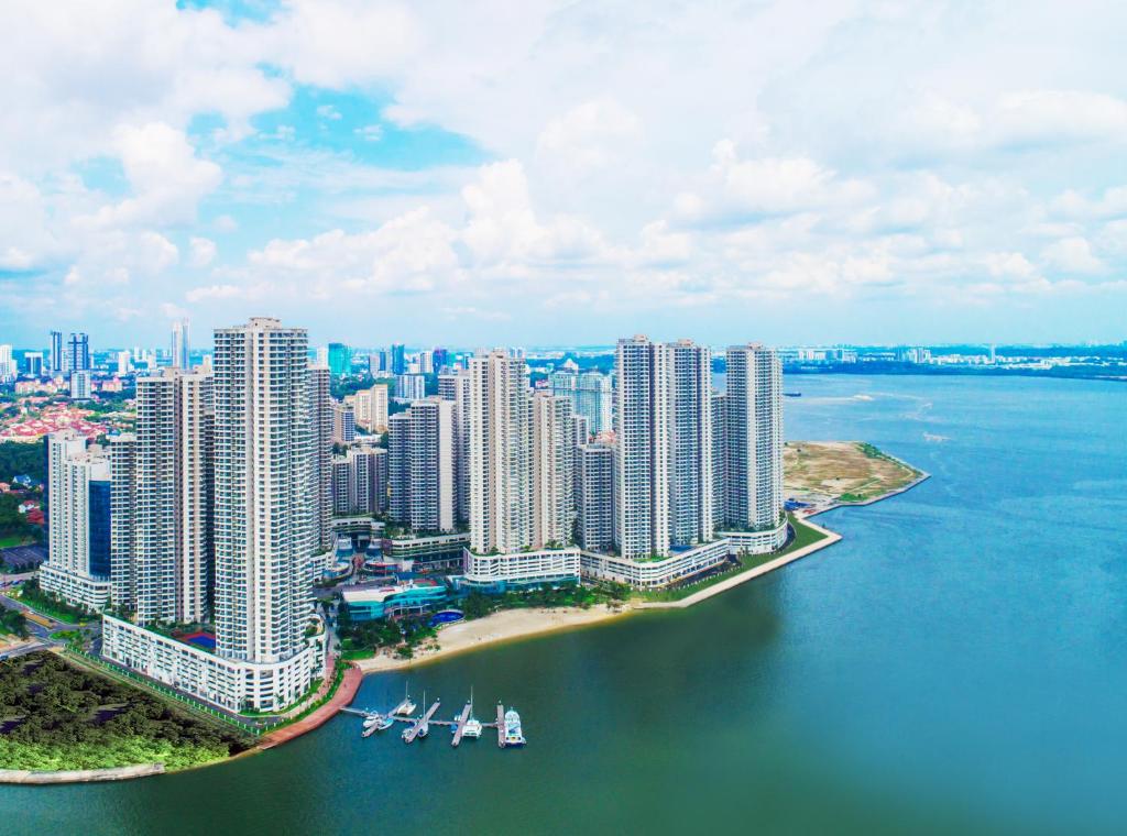 an aerial view of a city with tall buildings at Country Garden Danga Bay by Lions Bay in Johor Bahru