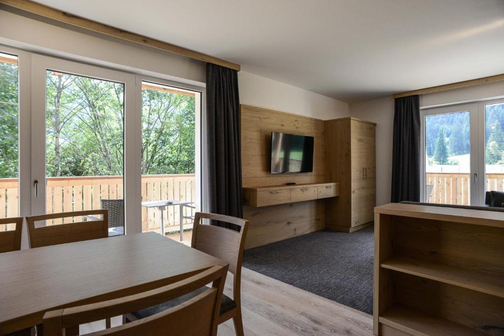 TV a/nebo společenská místnost v ubytování R Appartements Sommerbergbahnen inklusive