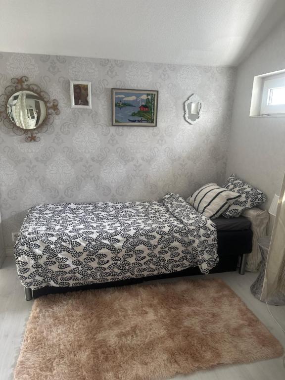 Кровать или кровати в номере Small guest room