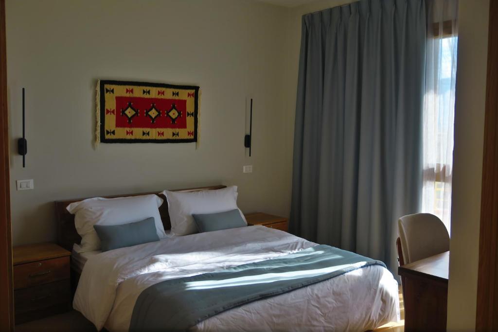 Postel nebo postele na pokoji v ubytování Doko Hotel