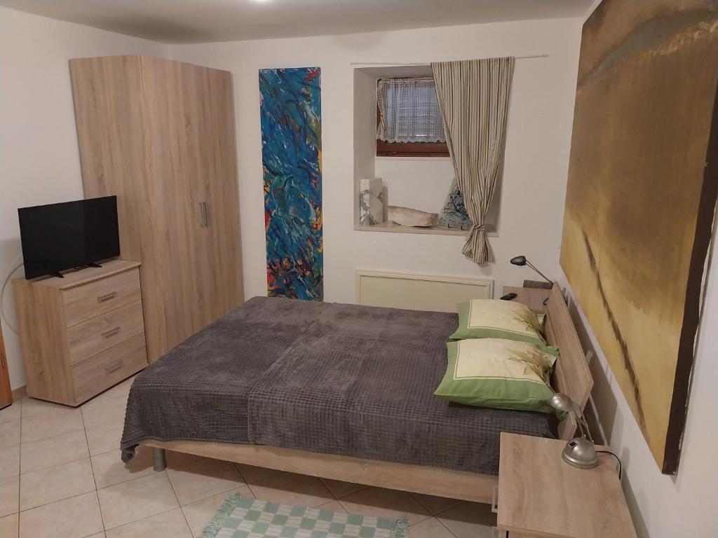Postel nebo postele na pokoji v ubytování App Antonija