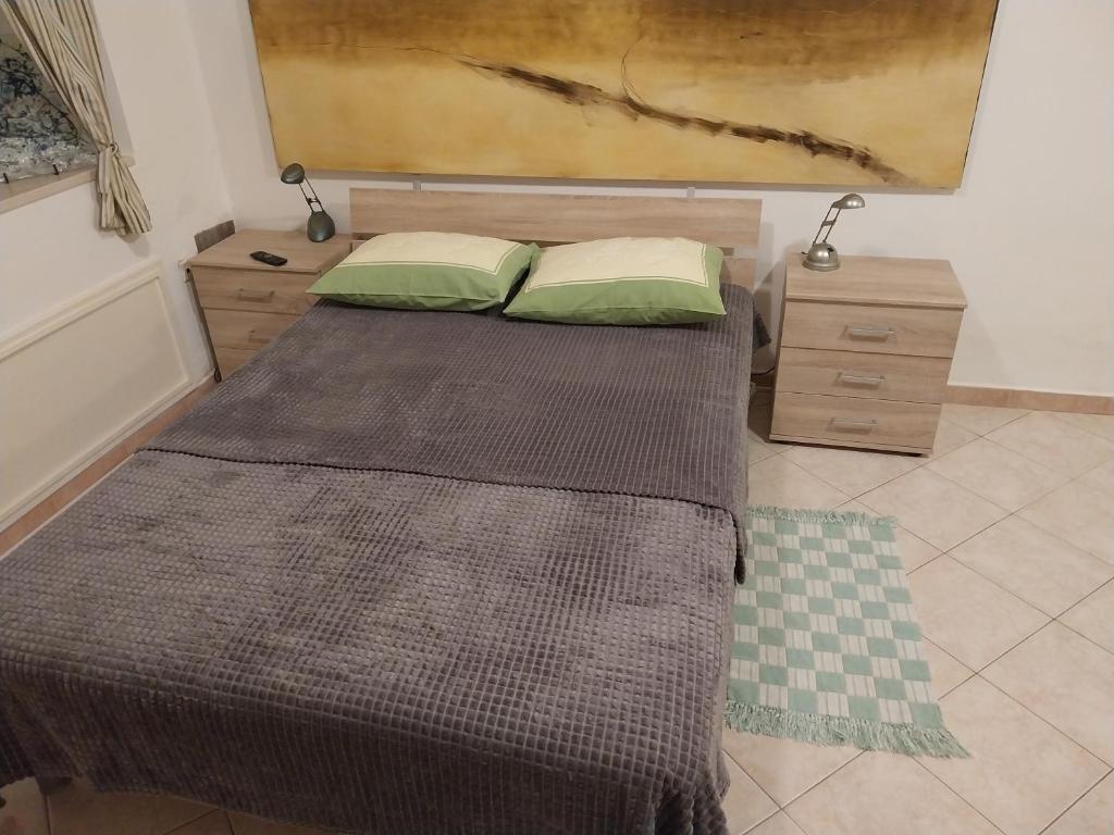 Postel nebo postele na pokoji v ubytování App Antonija