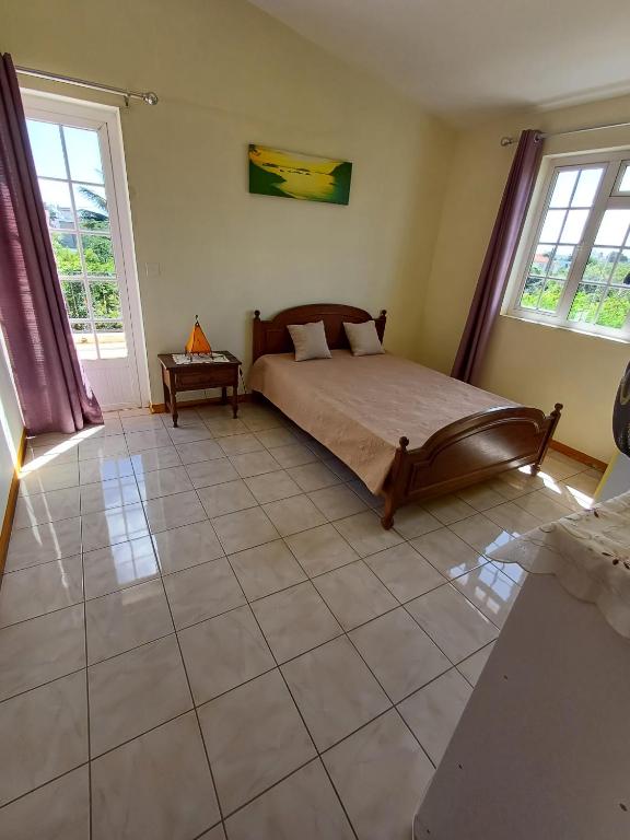 Postel nebo postele na pokoji v ubytování Villa kartner