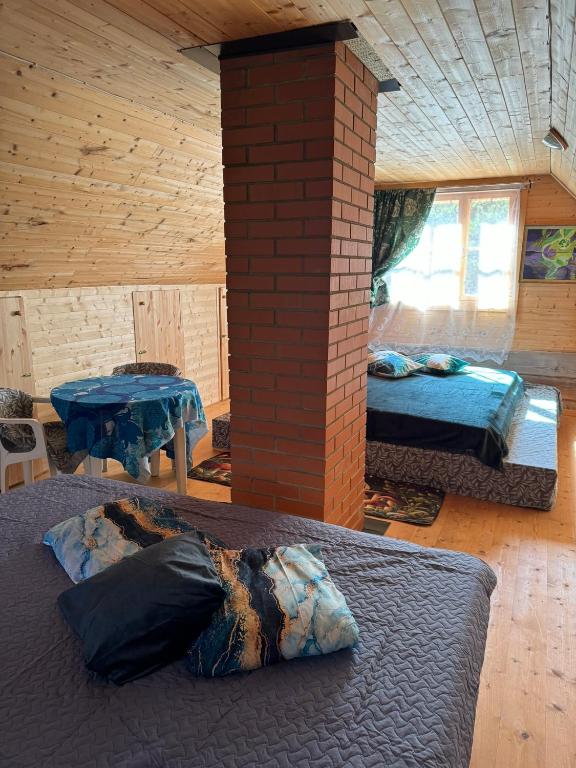 Postel nebo postele na pokoji v ubytování Ninase Puhkemajad