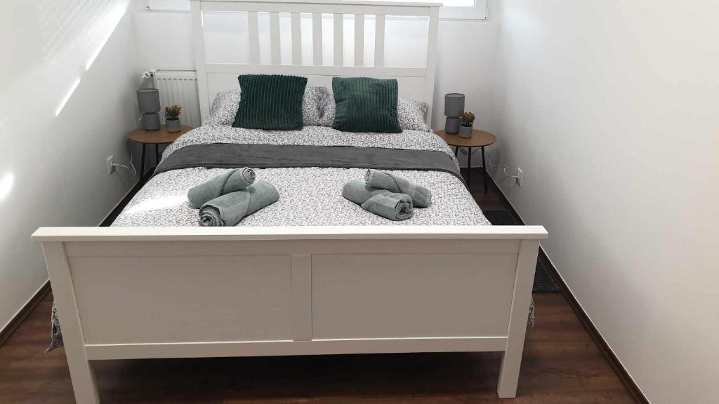 Ένα ή περισσότερα κρεβάτια σε δωμάτιο στο Apartman Lamarti