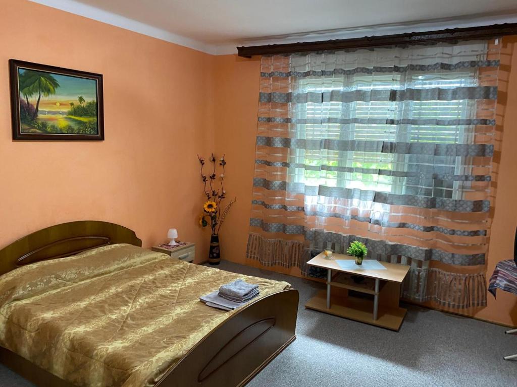 מיטה או מיטות בחדר ב-Casa Augustina