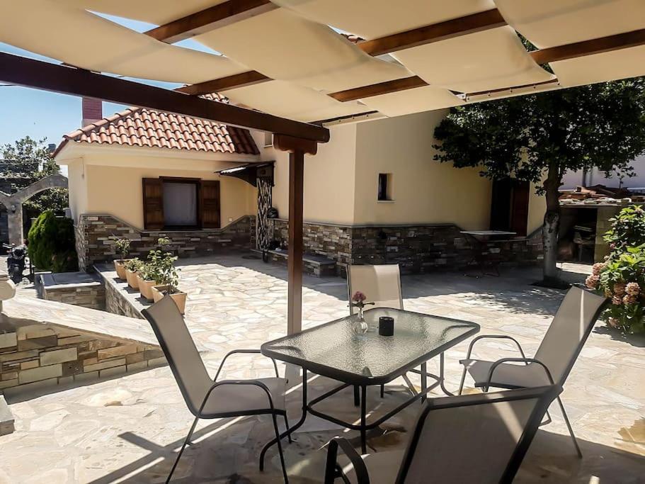 Patio nebo venkovní prostory v ubytování Υλονόμη