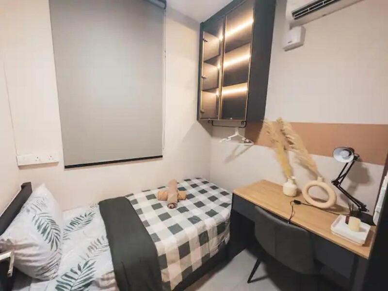 Postel nebo postele na pokoji v ubytování NeuSuite Cozy Studio by GUESTONIC