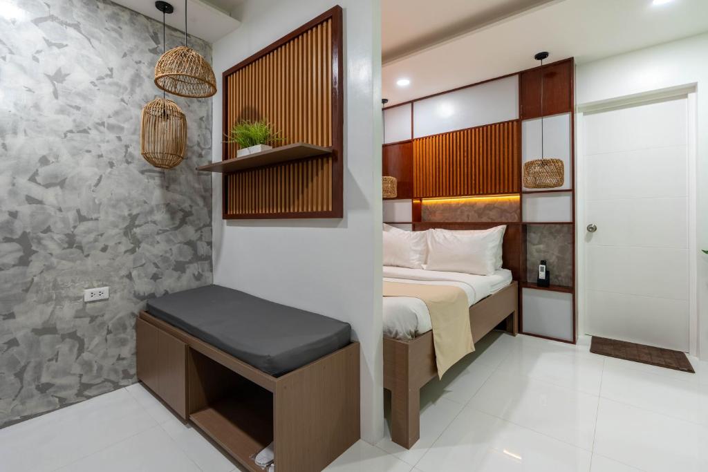 Postel nebo postele na pokoji v ubytování Serene Oasis Resort - Oslob Cebu Philippines