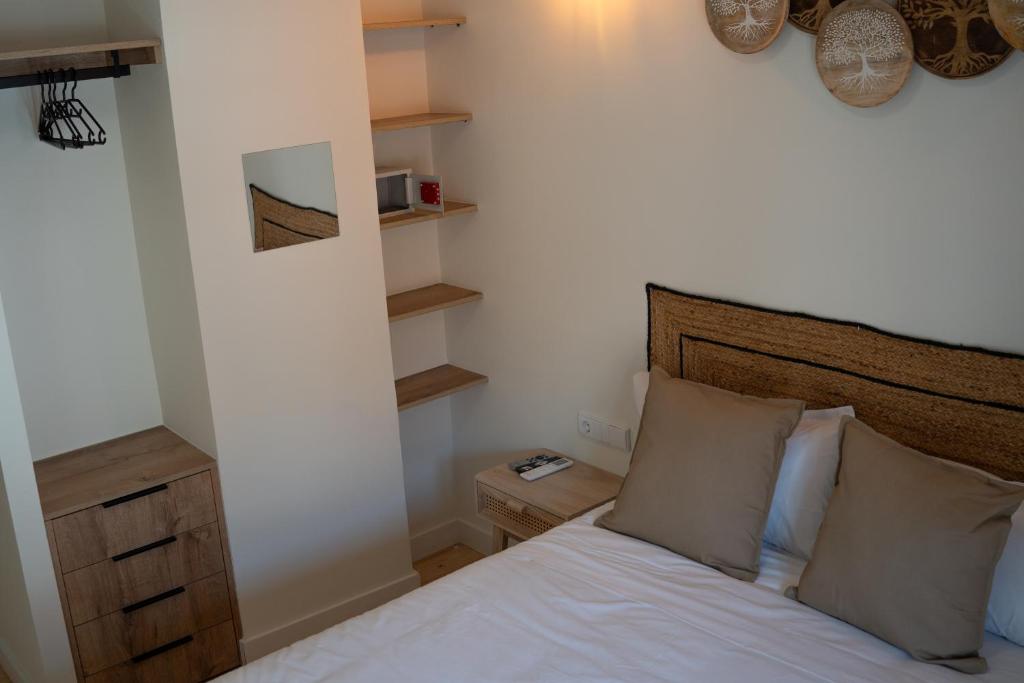 Postel nebo postele na pokoji v ubytování Hotel Boutique - Estancia dos Olivos