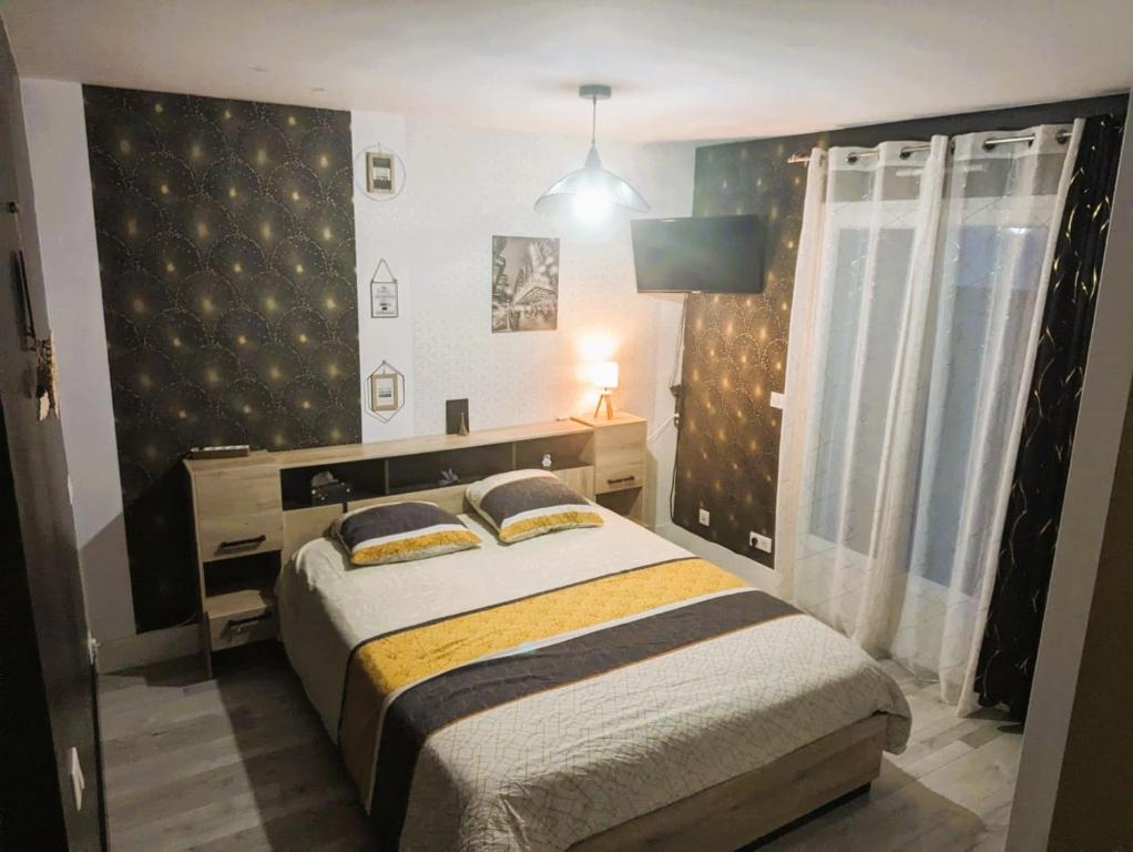 Postel nebo postele na pokoji v ubytování Landes Conviviales, CHAMBRES chez l'habitante, Laëtitia !
