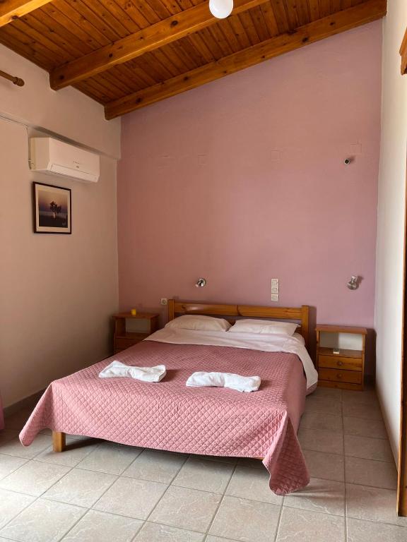 Postel nebo postele na pokoji v ubytování Ilios Kalamaki