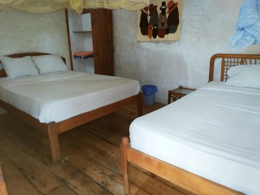 Postel nebo postele na pokoji v ubytování Bed and Breakfast Puerto López