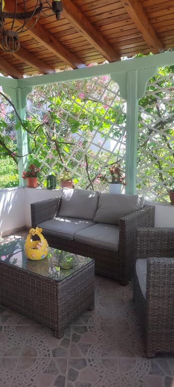 A seating area at Krinelos Rooms