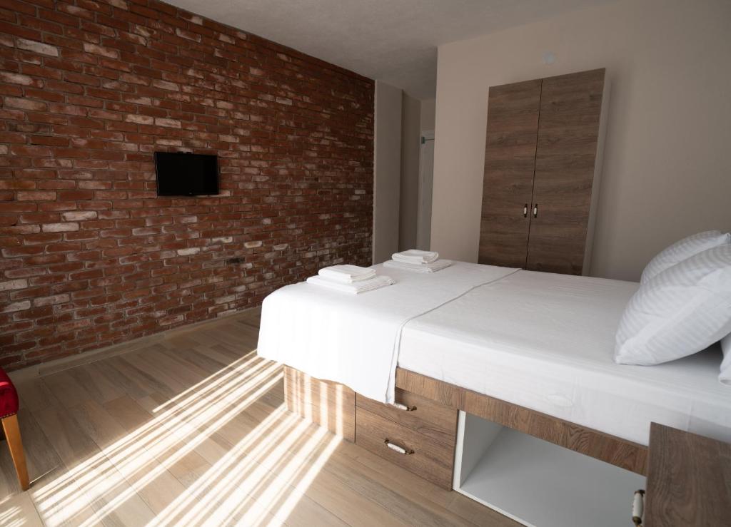 Postel nebo postele na pokoji v ubytování Harakop Otel