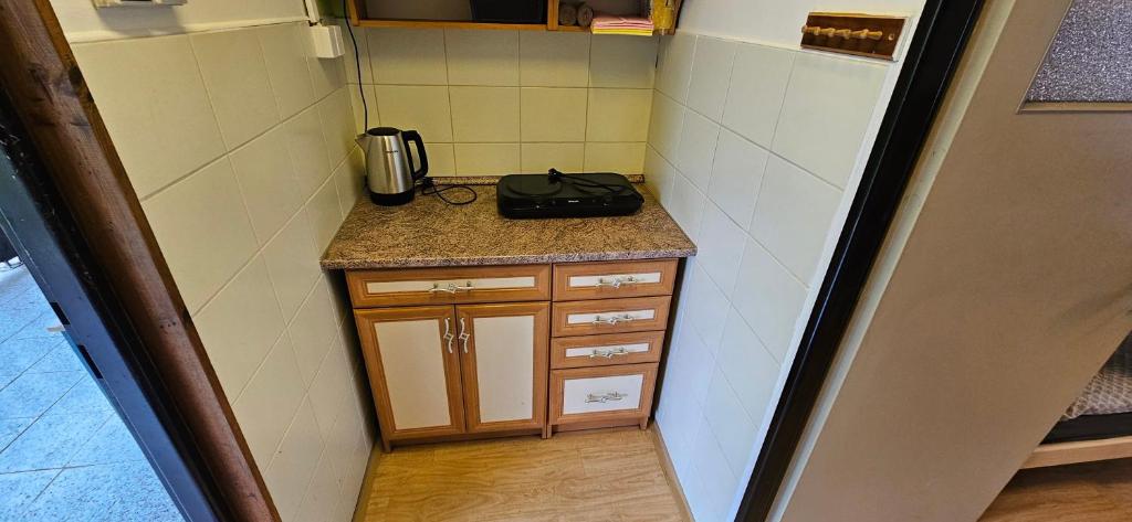 Kuchyň nebo kuchyňský kout v ubytování Chatka Matouš