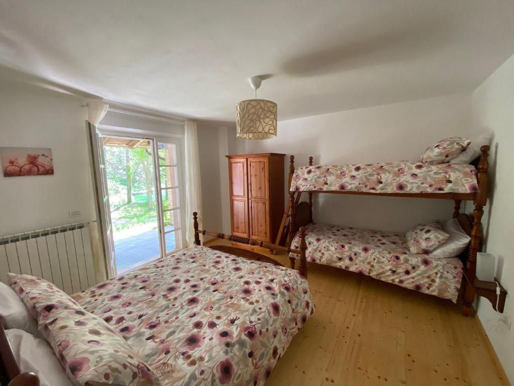 Postel nebo postele na pokoji v ubytování Casa delle Risorgive