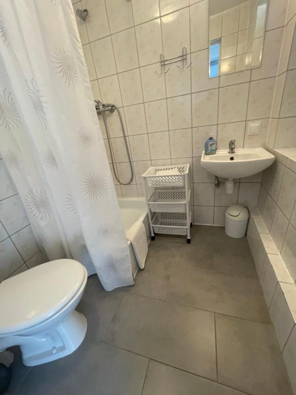 Kúpeľňa v ubytovaní Kama Pokoje Gościnne