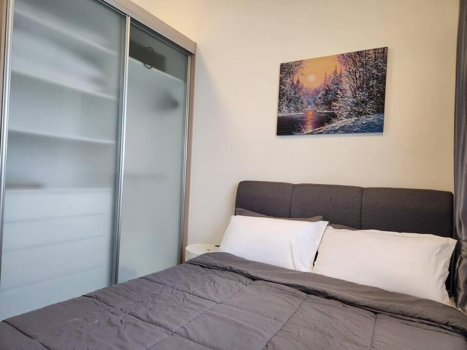 Postel nebo postele na pokoji v ubytování Antara Lima Homestay Putrajaya