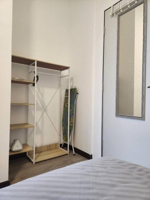 Postel nebo postele na pokoji v ubytování Antara Lima Homestay Putrajaya