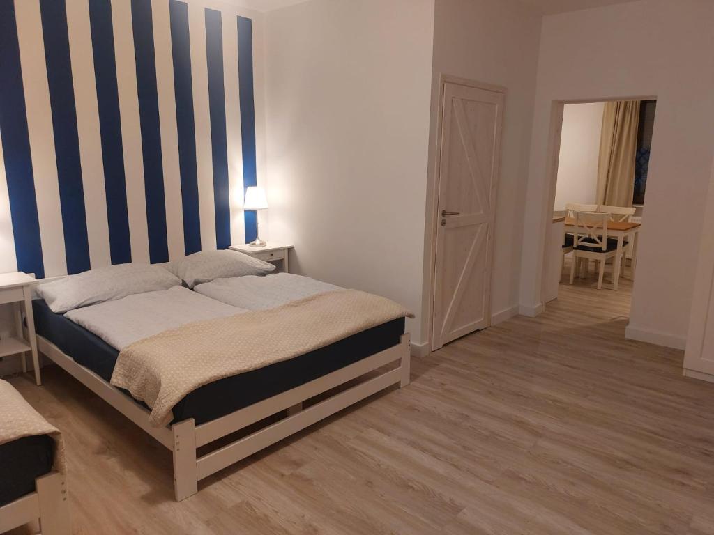 Postel nebo postele na pokoji v ubytování Bajkowy Las
