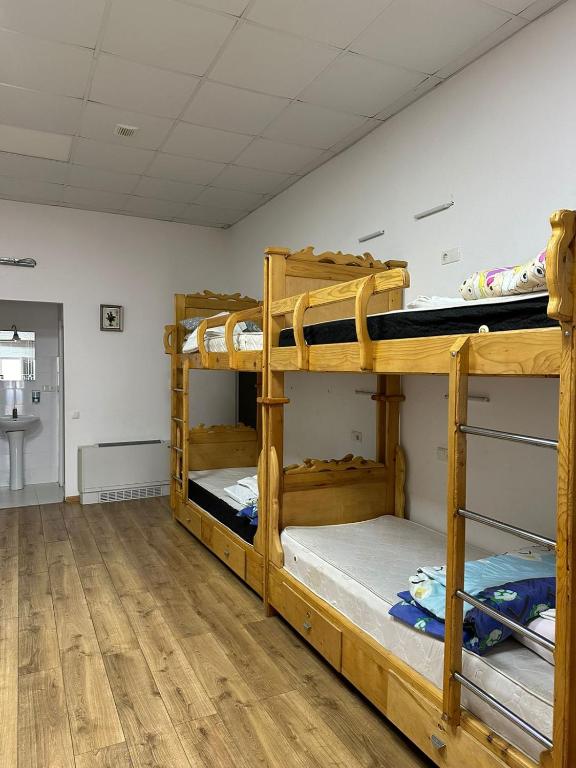 Postel nebo postele na pokoji v ubytování KING Plus