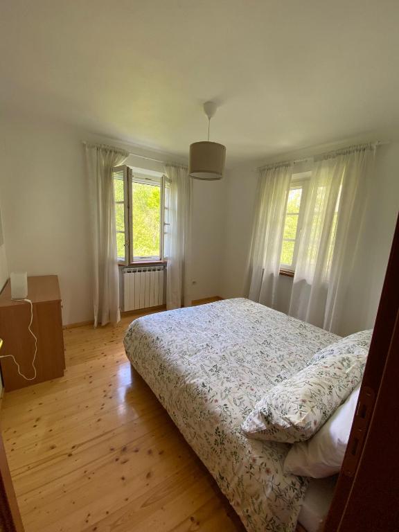 Postel nebo postele na pokoji v ubytování Casa delle Risorgive