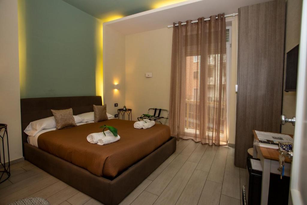 Ένα ή περισσότερα κρεβάτια σε δωμάτιο στο Bell's