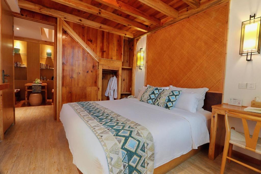 Postel nebo postele na pokoji v ubytování Mild Spring Boutique Hotel