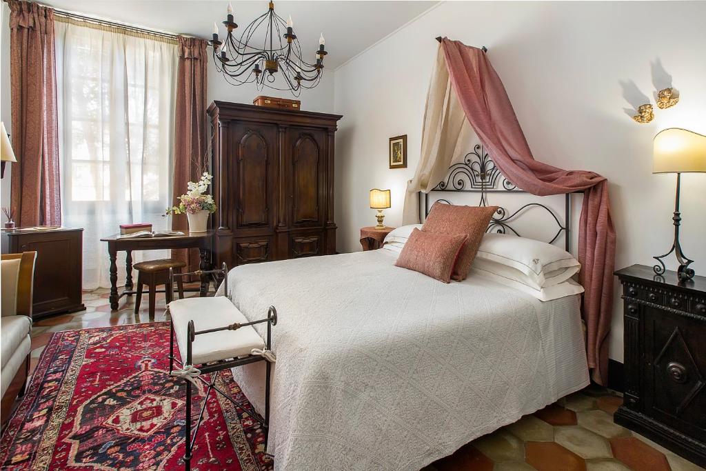 Postel nebo postele na pokoji v ubytování Abbadia San Giorgio