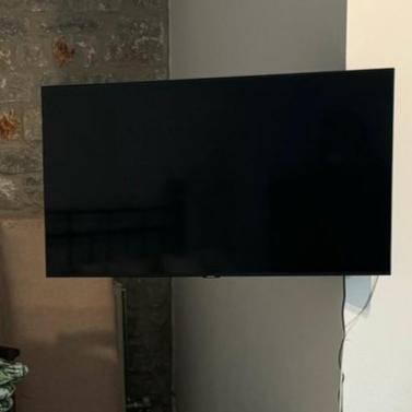 TV a/nebo společenská místnost v ubytování Enada Suite & Olive Farm