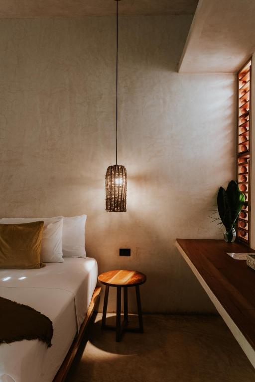 Postel nebo postele na pokoji v ubytování Casona los Cedros