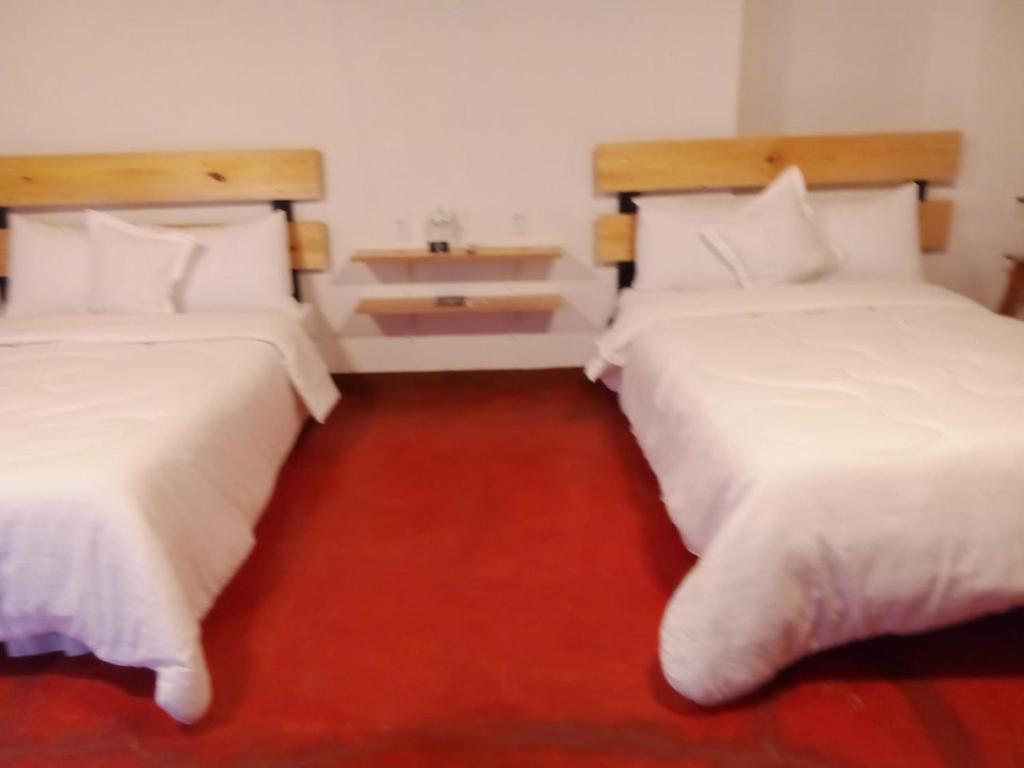 Postel nebo postele na pokoji v ubytování Alojamiento El Fresno