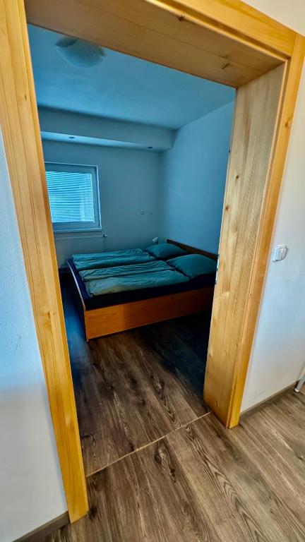 Postel nebo postele na pokoji v ubytování Apartmán Lilly