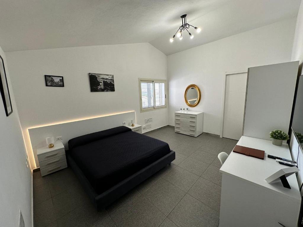 Posezení v ubytování LXR Rooms Carloforte