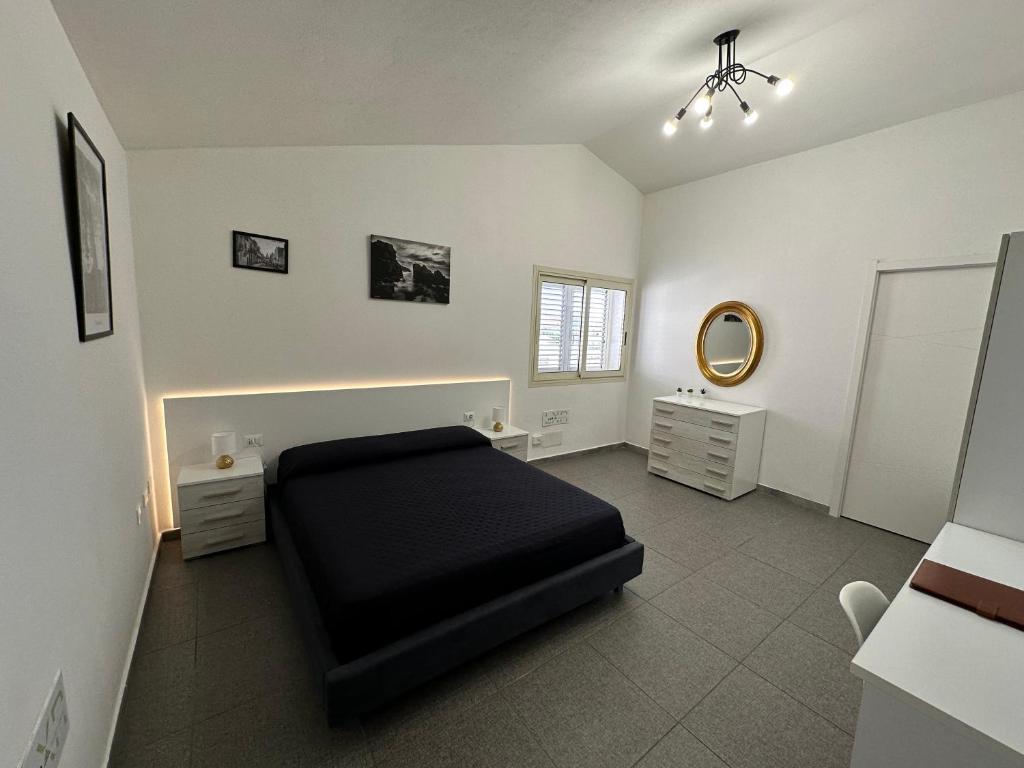 Posezení v ubytování LXR Rooms Carloforte