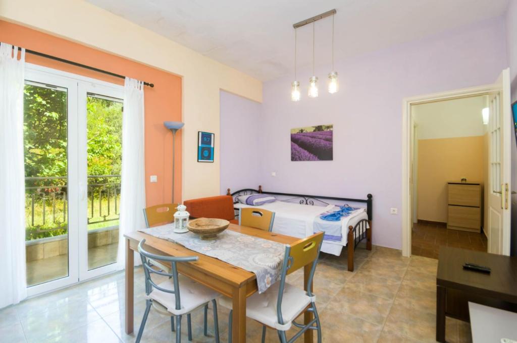 Postel nebo postele na pokoji v ubytování Scorpios Apartments