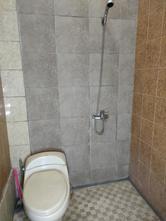 Koupelna v ubytování Hotel Residence 5 Syariah