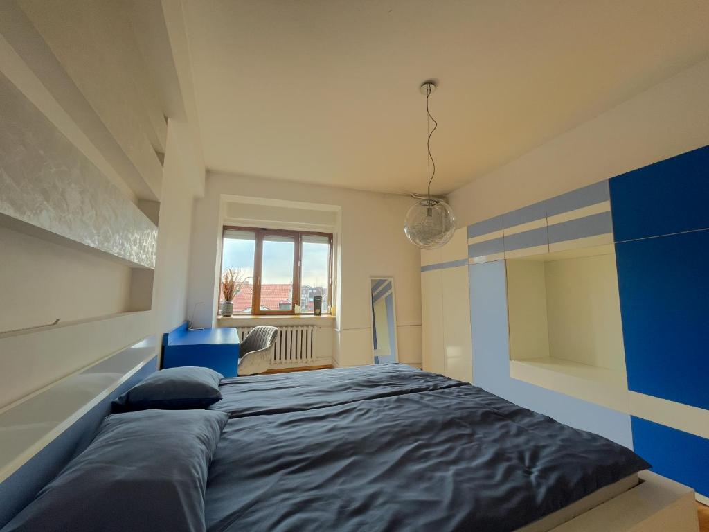 Postel nebo postele na pokoji v ubytování Spacious Flat on Sofia's Main Street
