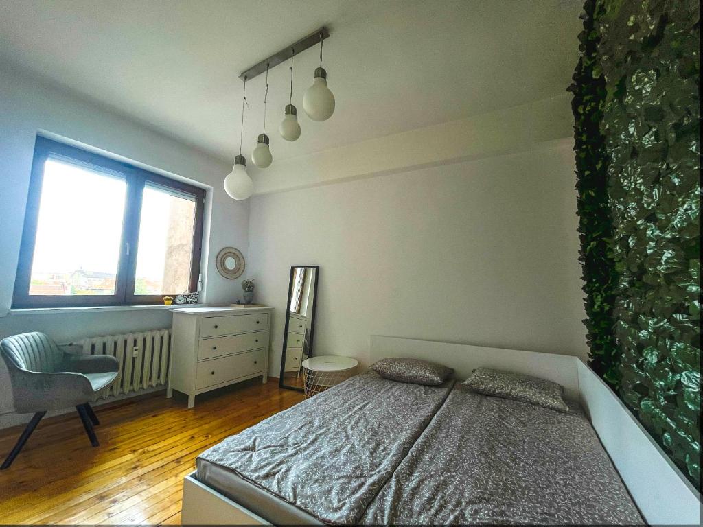 Postel nebo postele na pokoji v ubytování Spacious Flat on Sofia's Main Street