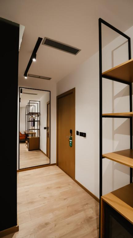 Postel nebo postele na pokoji v ubytování BAZ'HUR Boutique Hotel