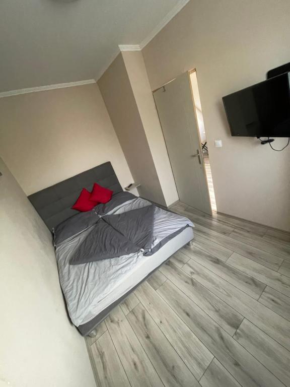 Postel nebo postele na pokoji v ubytování Renáta Apartman