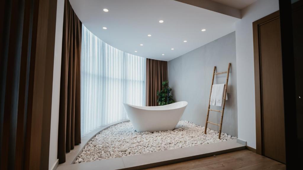 Koupelna v ubytování BAZ'HUR Boutique Hotel
