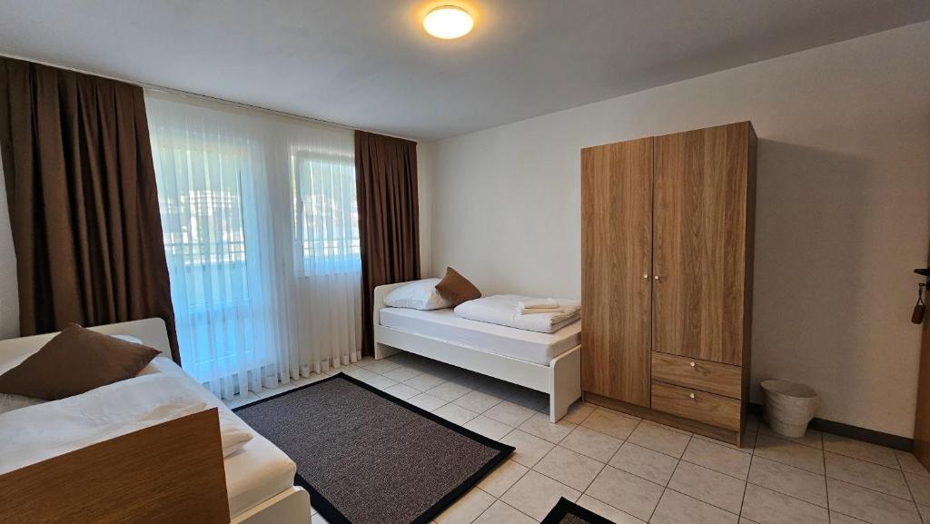 Postel nebo postele na pokoji v ubytování Elha Hotel