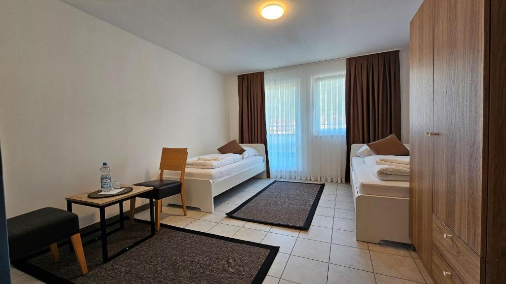 Postel nebo postele na pokoji v ubytování Elha Hotel