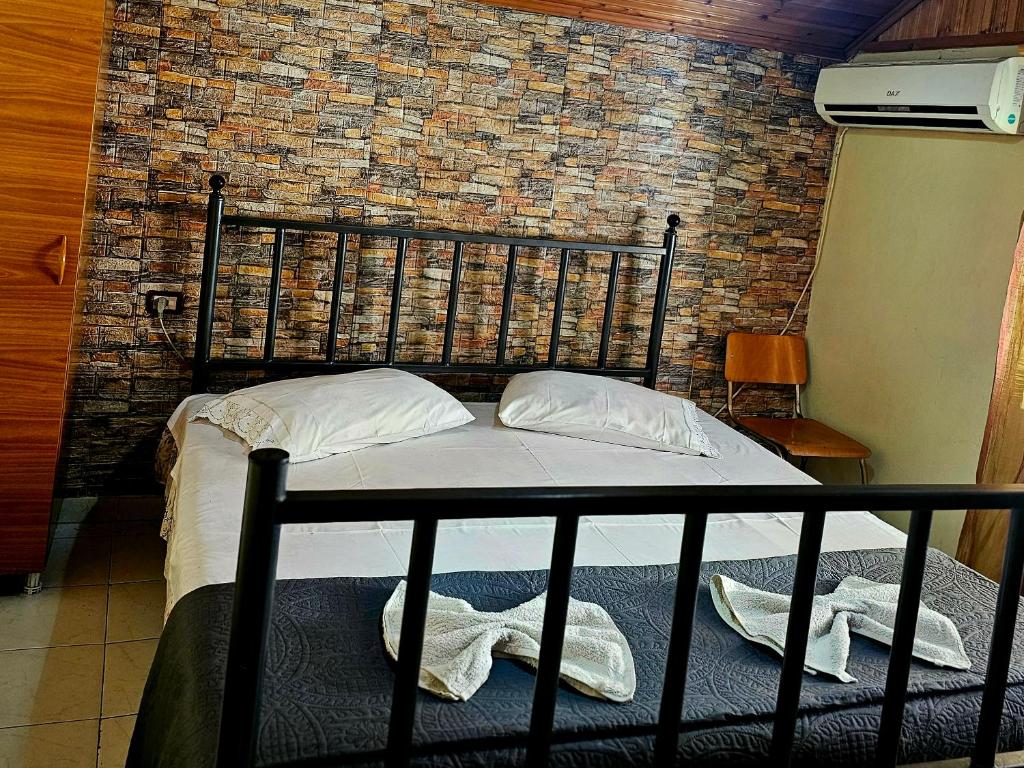 Postel nebo postele na pokoji v ubytování Dafina Hotel
