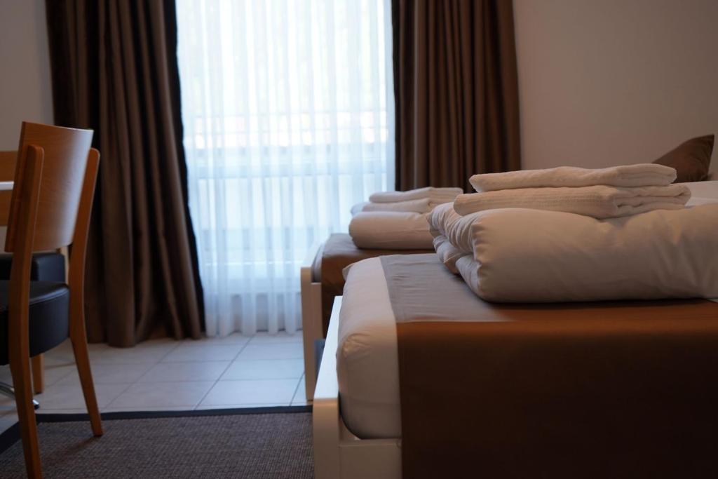 Postel nebo postele na pokoji v ubytování Elha Hotel