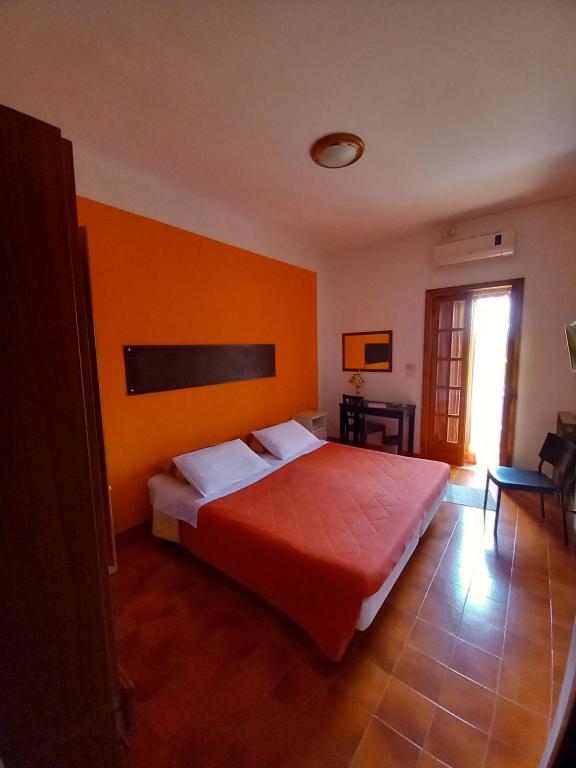 Postel nebo postele na pokoji v ubytování Breezes B&B
